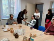 Na fotografii zleva: p. Lukačina, p. Cabajová, DiS. – předává cenu p. Zoufalému, vpovzdálí p. Bc. Kuczová, p. Neckářová, p. Parkosová, DiS.